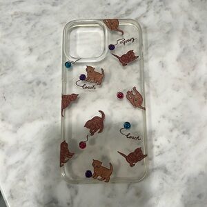 Coach iPhone 13 Pro Max case. MagSafe. Cats chasing yard.